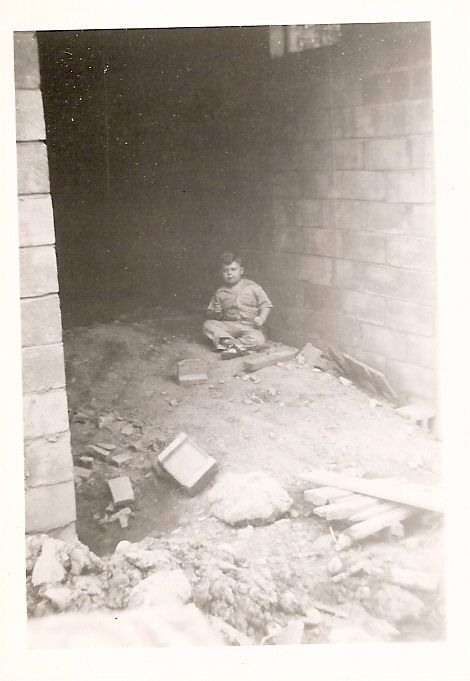 John Eld playing in house on Valera Street.jpg